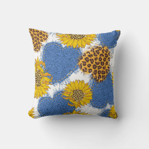 Denim hearts made of fabric with torn edges and le cushion