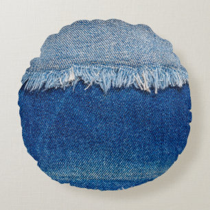 Denim jeans background. Ripped denim fabric with b Round Cushion