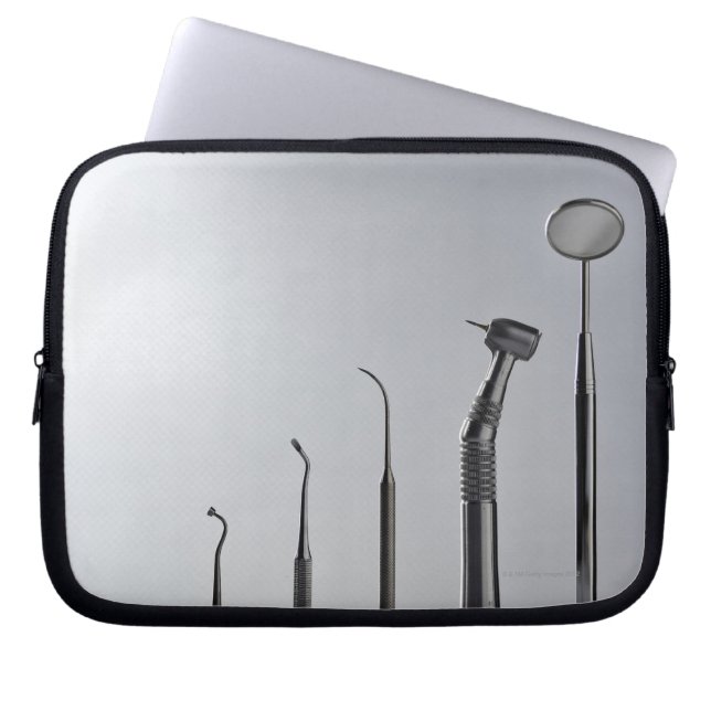Dentist's instruments laptop sleeve (Front)