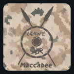 Desert Maccabee Shield And Spears Square Sticker<br><div class="desc">A military brown "subdued" style depiction of a Maccabee's shield and two spears on a desert camo background. The shield is adorned by a lion and text reading "Yisrael" (Israel) in the Paleo-Hebrew alphabet. English text reading "Maccabee" also appears. The Maccabees were Jewish rebels who freed Judea from the yoke...</div>