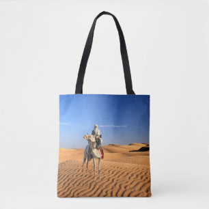 Desert man on a camel tote bag