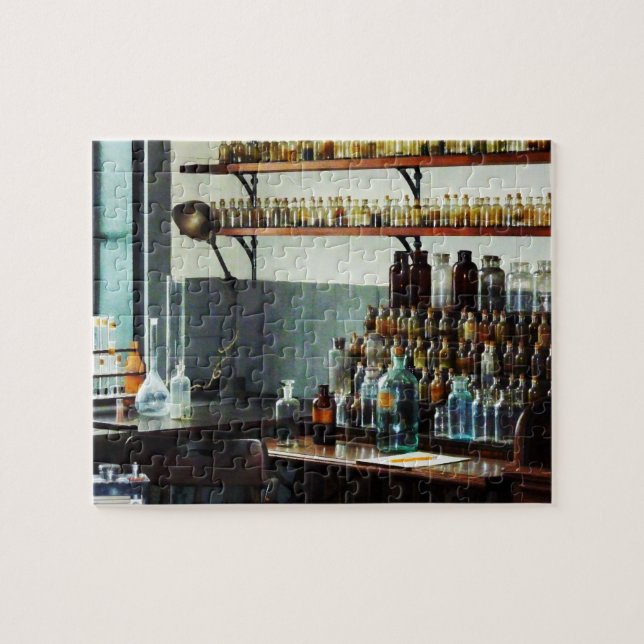 Desk With Bottles of Chemicals Jigsaw Puzzle (Horizontal)