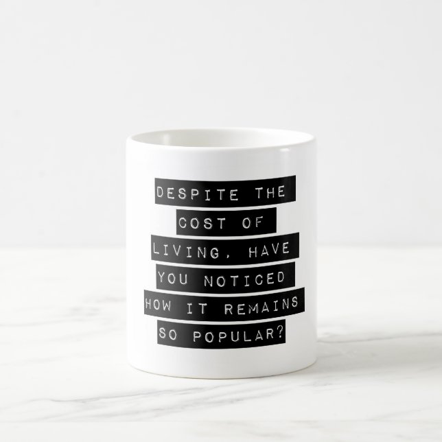 Despite The Cost Of Living Coffee Mug (Center)