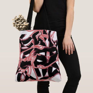 Destroyed black and salmon scraps or tape on white tote bag