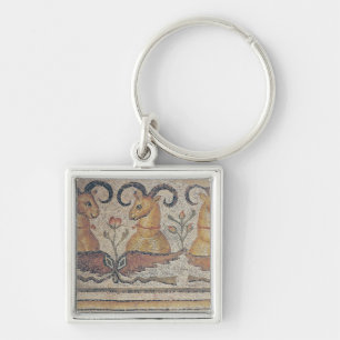 Detail from the border of a pavement key ring