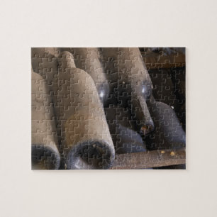 Detail of dusty bottles sur lattes on wooden jigsaw puzzle