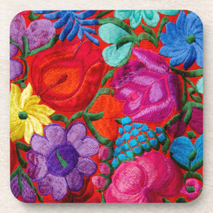 Detail of traditional embroidery floral textile coaster