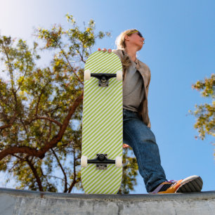 Diagonal lime green and white stripes pattern skateboard