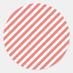 Diagonal pattern of pink and white stripes classic round sticker