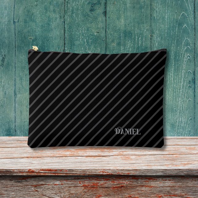 Diagonal stripes and custom name on black accessory pouch (Creator Uploaded)