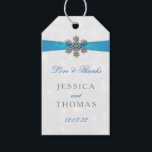 Diamante Snowflake & Blue Ribbon Winter Wedding Gift Tags<br><div class="desc">The diamante snowflake & blue ribbon wedding collection is perfect for any couple planning a romantic winter wedding celebration. The design features a light silvery grey and white snowflake textured background with a diamante snowflake on top of a silky looking ribbon. The wording incorporates the same silvery grey and blue...</div>