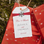 Diamante Snowflake & Red Ribbon Winter Wedding Gift Tags<br><div class="desc">The diamante snowflake & red ribbon wedding collection is perfect for any couple planning a romantic winter wedding celebration. The design features a light silvery grey and white snowflake textured background with a diamante snowflake on top of a silky looking ribbon. The wording incorporates the same silvery grey and red...</div>