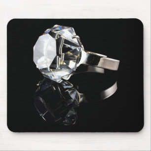 Diamond ring on black mouse pad