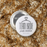 Diamond Ring Team Bride Bachelorette<br><div class="desc">Team bride button in white with charming black text and an illustration of a diamond engagement ring. Personalise with the bride's name (or the wearer's name) and the date of the event.</div>