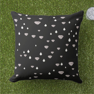 diamonds raindrops scattered on black cushion