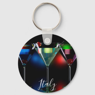 Different cocktails in martini glasses with lights key ring