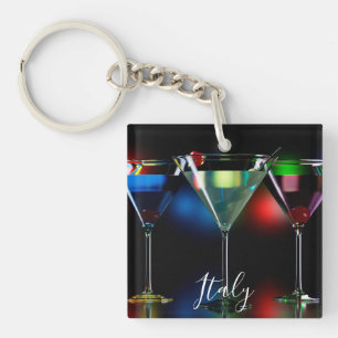 Different cocktails in martini glasses with lights key ring
