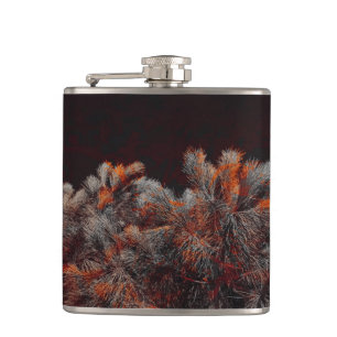 Digital art of pine tree with orange colour spots hip flask