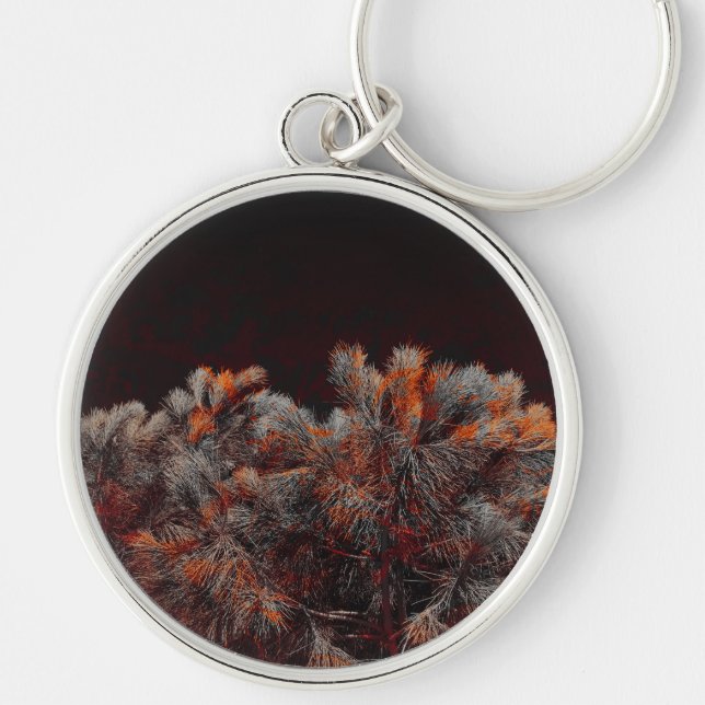 Digital art of pine tree with orange colour spots key ring (Front)