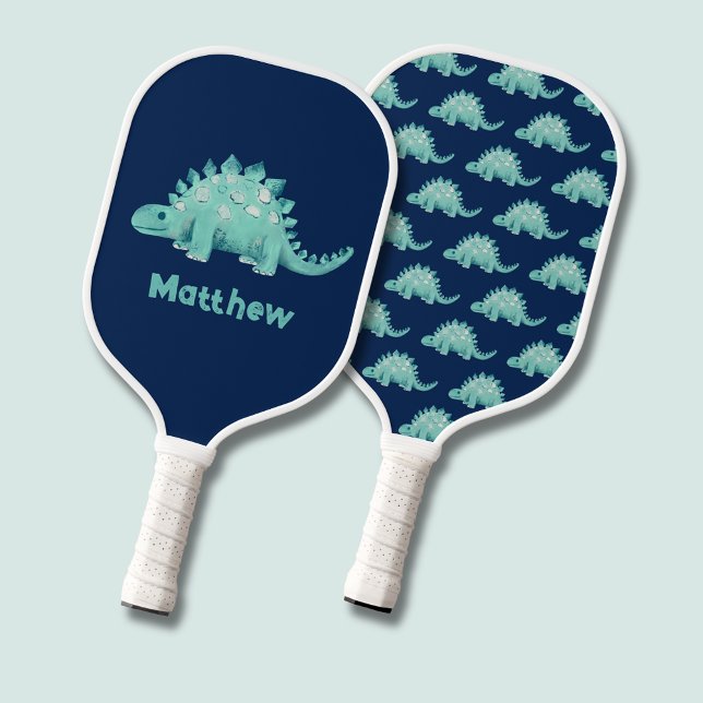 Dinosaur Kids Pickleball Paddle (Cute dinosaur stegosaurus pickleball paddle. Personalize with your own name. Pattern to one side.)