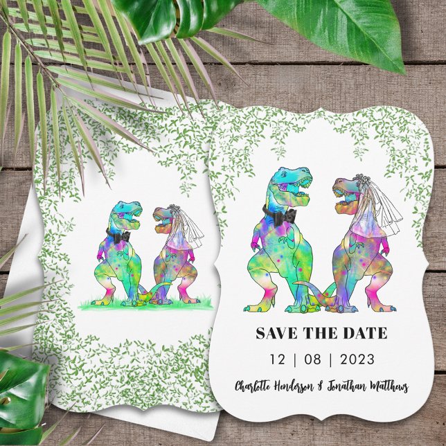 Dinosaur Themed Wedding Save The Date (Dinosaur wedding save the date invitation with colorful T-Rex bride & groom Jurassic jungle foliage )