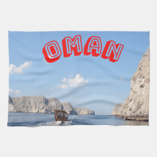 Discover the Majestic Beauty of Oman's Coast Tea Towel