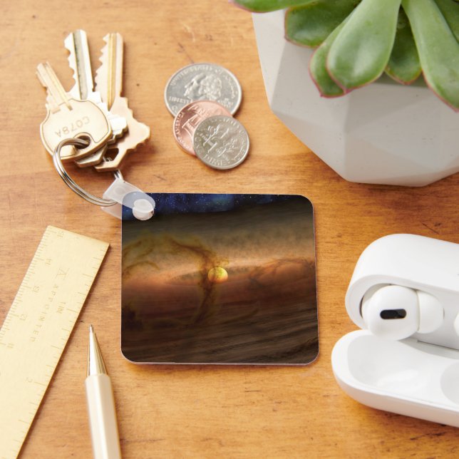 Discs Of Planet-Forming Material Circling Stars. Key Ring (Desk)