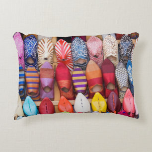 Displayed shoes in a shop in the souks decorative cushion