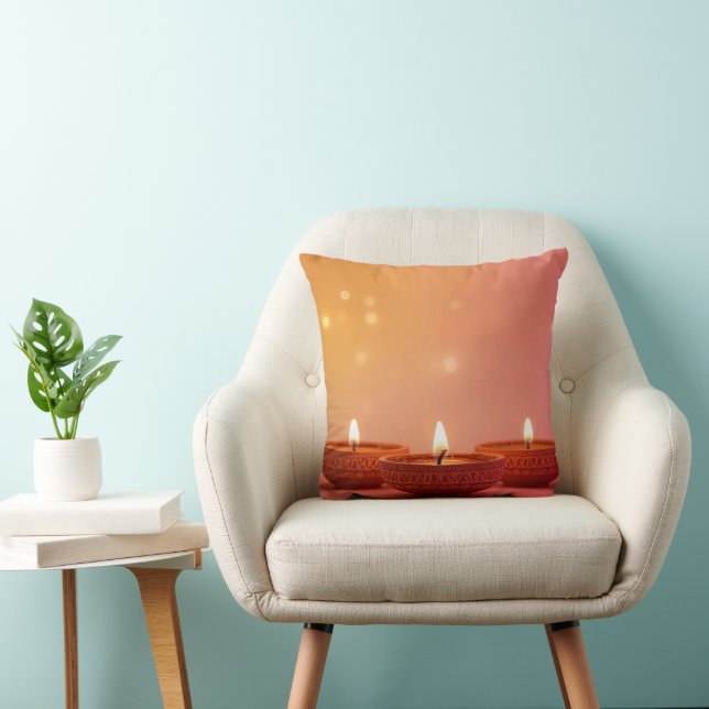 Diwali 2025 Throw Pillow – Three Glowing Diyas Hom (Chair)