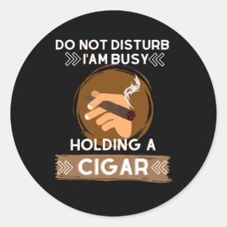 Do not Disturb I am busy holding a Cigar Classic Round Sticker