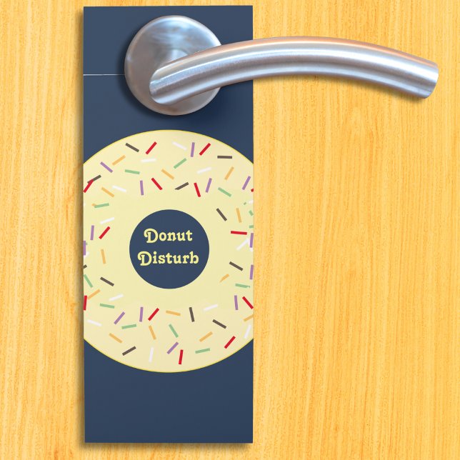 Do Not Disturb Please Knock 2-Sided Funny Doughnut Door Hanger (A donut image door handle sign with 'Donut Disturb' message on one side, 'Please Knock' on the other)