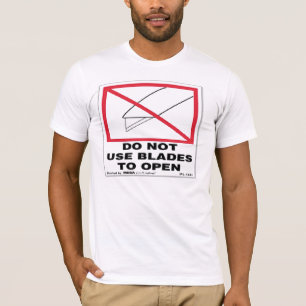 Do not use blades to open T-Shirt
