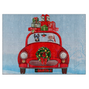 Doberman Dog In Car With Santa Claus  Cutting Board