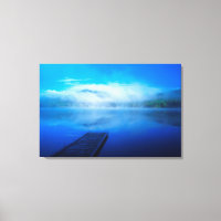 Dock on calm misty lake, California