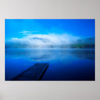 Dock on calm misty lake, California