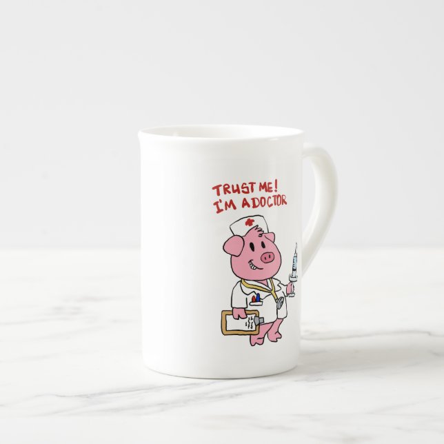 Doctor pig with syringe in hand | choose back colo bone china mug (Front Right)