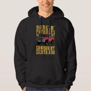 Dodging Potholes In My Sunburnt  Sand In My Boots Hoodie