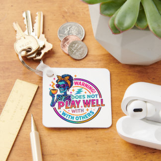 Does Not Play Well.... Key Ring