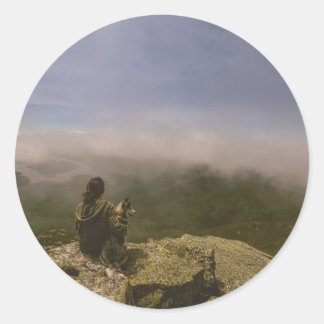 Dog and Woman on a Rocky Bluff Classic Round Sticker