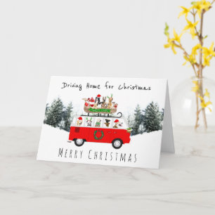 Dog campervan and sleigh driving home christmas card