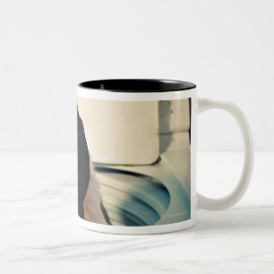 Dog helping out with the wash Two-Tone coffee mug