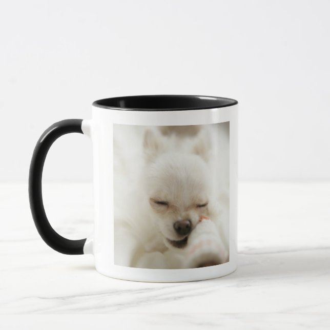 Dog holding toy in mouth mug (Left)