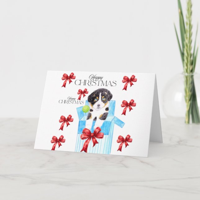 Dog in a blue box Christmas Card with bows  (Front)