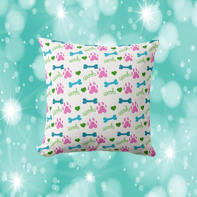 Dog Paw Bone Woof Pink Teal Green Cushion (A cute throw pillow featuring pink dog paws, blue bones and green woofs.)