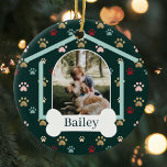 Dog Paw Print Pattern Custom Name Dog House Photo Ceramic Tree Decoration<br><div class="desc">Customise this fun and unique multi-coloured pet paw print pattern ornament design featuring two photos. Design features a dog house design with the door of the dog house featuring your custom pet's photo. Personalise the white dog bone with the pet's name. This is a fun keepsake gift to celebrate your...</div>