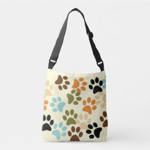 Dog pawprint in retro colours crossbody bag