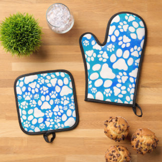 Dog Paws on Blue Background by Glenda S. Harlan Oven Mitt & Pot Holder Set