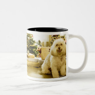 dog posing in front of Christmas tree Two-Tone Coffee Mug