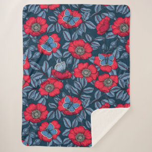 Dog rose and butterflies in blue and red sherpa blanket