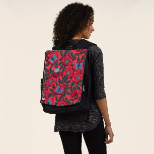 Dog rose and butterflies in red and blue backpack